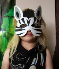 Party Girl in the Zebra mask she made as part of the craft activity